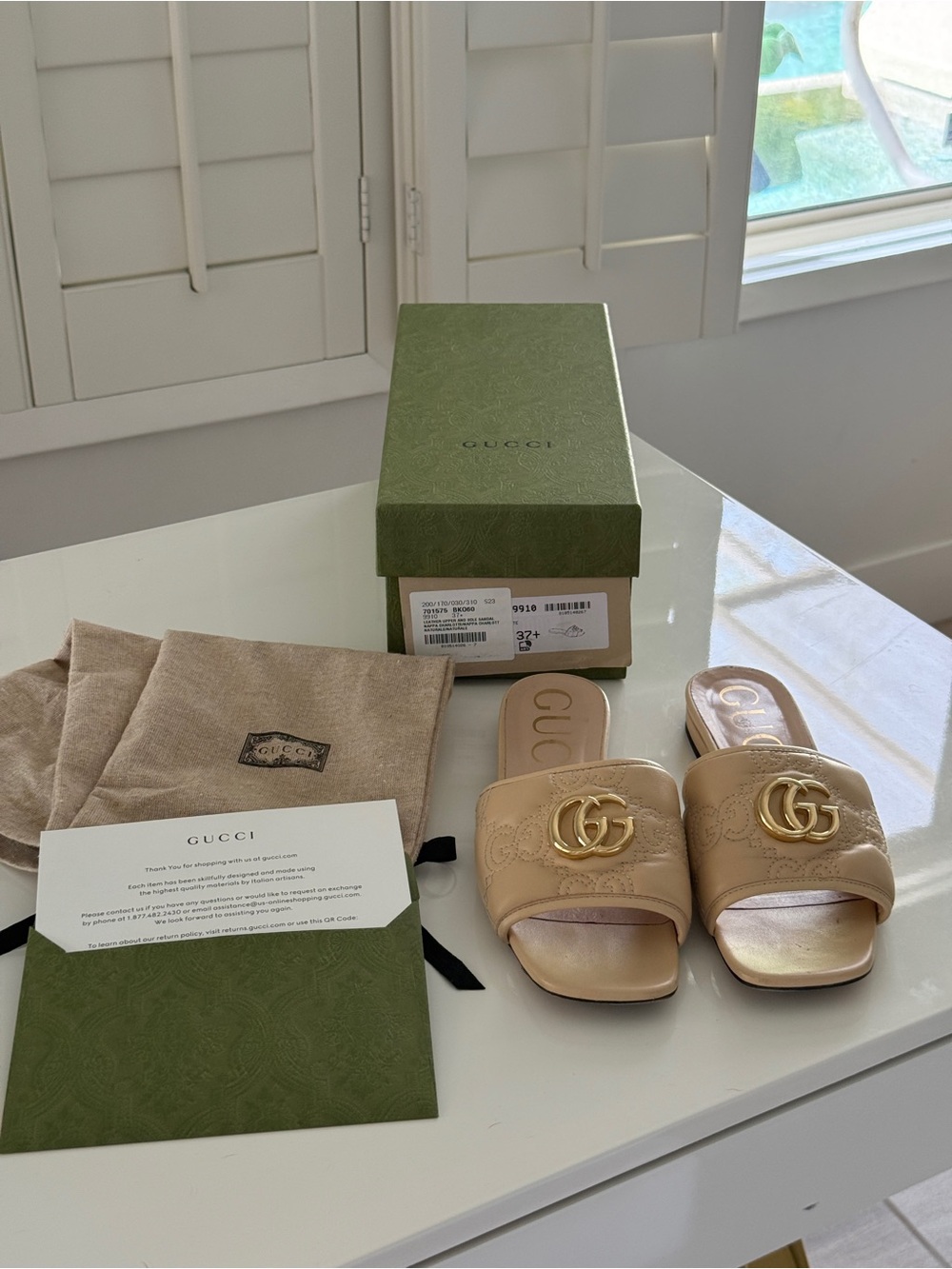 Gucci Women's Beige Matelasse Leather Slide Sandals